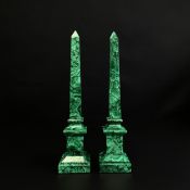 A pair of early 20th century malachite obelisks each in two parts. (With damage as seen). H.30cm