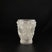 A late 20th century Bacchantes frosted glass vase with a moulded figure group of nude dancers in