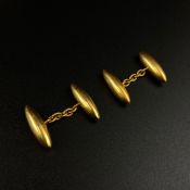 A pair of 10ct gold cufflinks of torpedo form. Weight: 5.5g