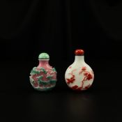 Two 19th century Chinese Qing dynasty carved cameo Peking glass snuff bottles to include one with