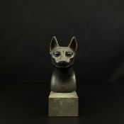 An ancient Egyptian style patinated bronze figural bust of a cat or the goddess Bastet with