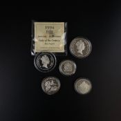 A collection of five silver proof commemorative coins to include New Zealand, Barbados and Fiji