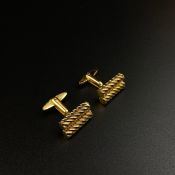 A pair of gold plated gentleman's cufflinks with a twin barley twist design by Christian Dior with