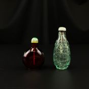 Two Chinese glass snuff bottles, possibly Imperial 18th century and later, to include a ruby red