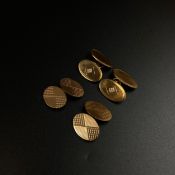 A pair of 9ct gold cufflinks hallmarked LAO of oval form inset with diamonds along with a pair of