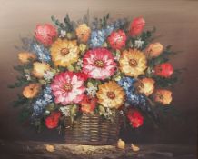 A 20th century oil painting on canvas, still life basket of flowers, in a gilt frame. H.60 W.69cm