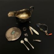 A collection of hallmarked silver to include a George III style footed gravy boat marked Harrods