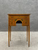 An George III satinwood side table having a kingwood crossbanded and ebony inlaid top hand painted