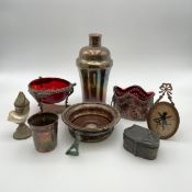 A collection of eight items to include an Art Deco Argentor cocktail shaker with marks, a Barker