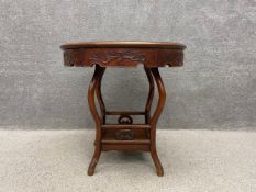 An early 20th century style Chinese hardwood side/occasional table with an inset white marble top