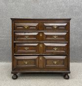 A William and Mary oak chest of drawers, C.1700 having a moulded top over and arrangement of eight