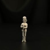 WITHDRAWN - See Lot 1 for a full explanation. A white metal figural propelling pencil in the form
