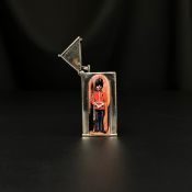 WITHDRAWN - See Lot 1 for a full explanation. A sterling silver vesta case in the form of a