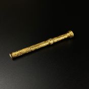 WITHDRAWN - See Lot 1 for a full explanation. An engraved yellow metal fountain pen/telescopic