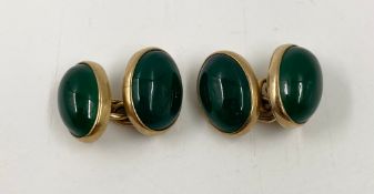 A pair of hallmarked 9ct gold and jade gentleman's cufflinks. Gross weight 3.25g