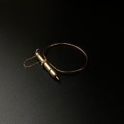 WITHDRAWN - See Lot 1 for a full explanation. A yellow metal propelling pencil in the form