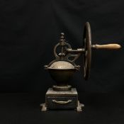 A C.1900 French iron table top coffee mill or grinder by Goldenberg & Co. with maker's marks cast