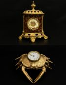 A small late 19th century British United Clock Co. mantle clock having a cup and cover finial over a