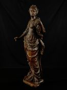 A large early 19th century French School carved oak figural statue, possibly Marianne; the Goddess