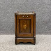 A Victorian rosewood coal scuttle having a pierced brass gallery back on a square marble top over