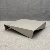 A contemporary folded sheet metal coffee table in the style of the Voila table by Bonido. H.22 W.100