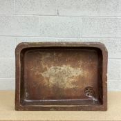 A 19th century salt glazed ceramic butler's sink in the form of a fluted shallow trough with