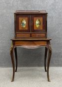 A French Louis XV style kingwood bonheur de jour or escritoire desk having a shaped cornice above