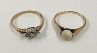 A hallmarked 9 carat gold stone set ring along with a 10 carat gold ring inset with a pearl. Gross