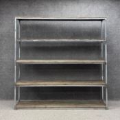 A large full height contemporary industrial welded steel and reclaimed pine shelving unit.. H.200