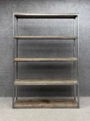 A contemporary full height industrial welded steel and reclaimed pine shelving unit. H.200 W.140 D.