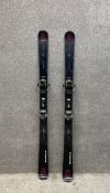A pair of black Kastle Fx84 woodcore and titanium skis set with Marker bindings. H.167 W.11cm