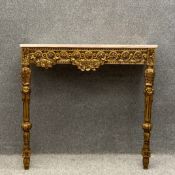 A Neoclassical 19th century style console table having a rectangular blush ivory marble top over a