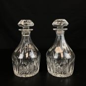 A pair of Georgian cut glass decanters with original stoppers. H.24cm