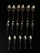Two sets of hallmarked silver spoons to include a set of six 19th century teaspoons by William