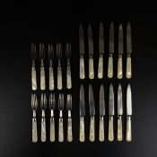 A near set of twelve C.1900 knives and ten forks with silver hallmarks and mother of pearl handles