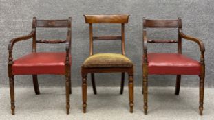 A collection of three chairs to include a pair of Regency mahogany rope back carvers each with
