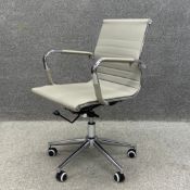 A contemporary beige ribbed leather and polished aluminium office or desk swivel chair with