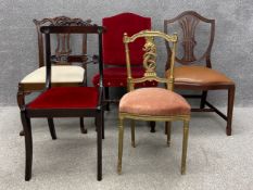 A collection of five chairs to include a renaissance style hall chair with red velvet upholstery