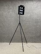 A contemporary industrial style floor standing lamp on tripod supports. H.200cm (fully extended)