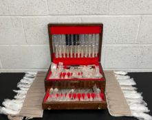 A large collection of silver plated cutlery to include a full service for twelve place settings in a