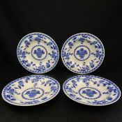 A set of four late 19th century Minton blue and white delft pattern plates. H.26cm