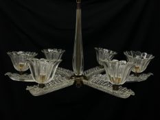 An early 20th century Art Deco Murano glass chandelier having a slender baluster form stem with five