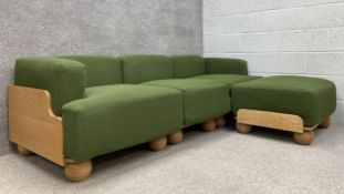 A contemporary handmade modular 'Cove' corner sofa by Fred Rigby having a low square cushioned