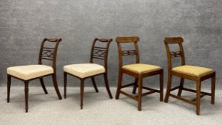 A pair of Regency mahogany dining chairs each having a carved top rail and a pierced and reeded