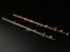 Two 19th century turned military style brass mounted flutes impressed with Upcott of Edgware road