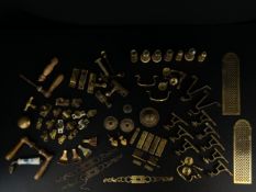 A large collection of 19th century and later brass and other metal fixings and fittings to include