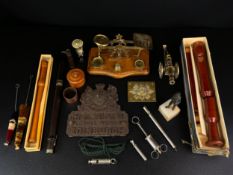 A mixed lot to include two recorders and a military style brass mounted flute together with an early