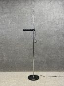A 1970's Tegola series floor lamp by Bruno Gecchelin for Skipper & Pollux on a circular marble base.