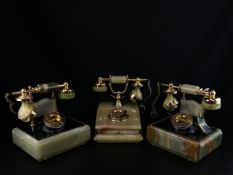 A collection of three vintage boxed British Telecom Romantic collection gold plate mounted onyx