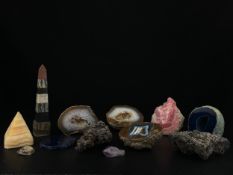 Geology and mineralogy interest; a collection of twelve items to include a whole geode split into